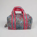 Grande trousse de toilette MAHÉ avec fermeture zippée fuchsia  