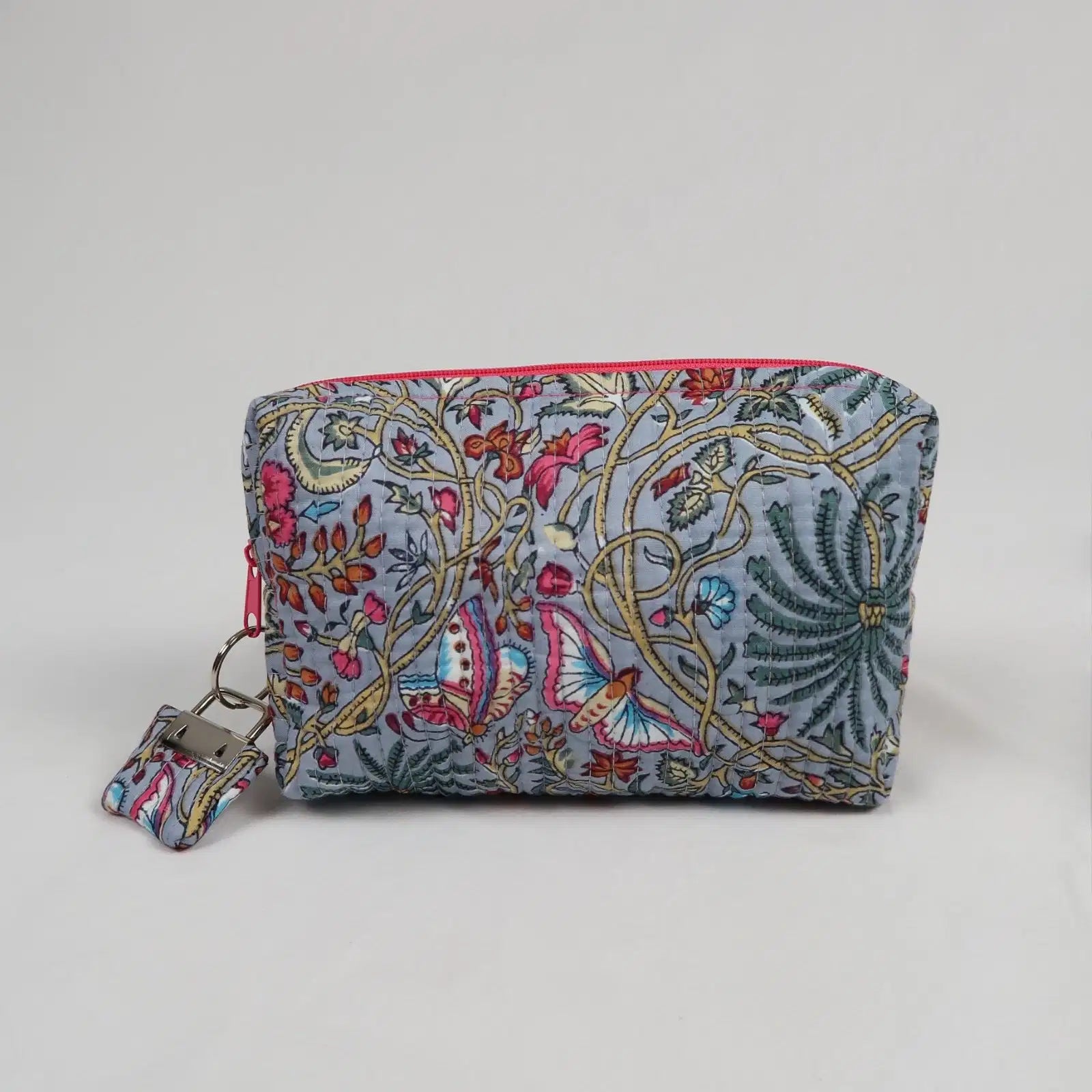 Petite trousse de toilette MAHÉ avec fermeture zippée fuchsia