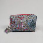Petite trousse de toilette MAHÉ avec fermeture zippée fuchsia
